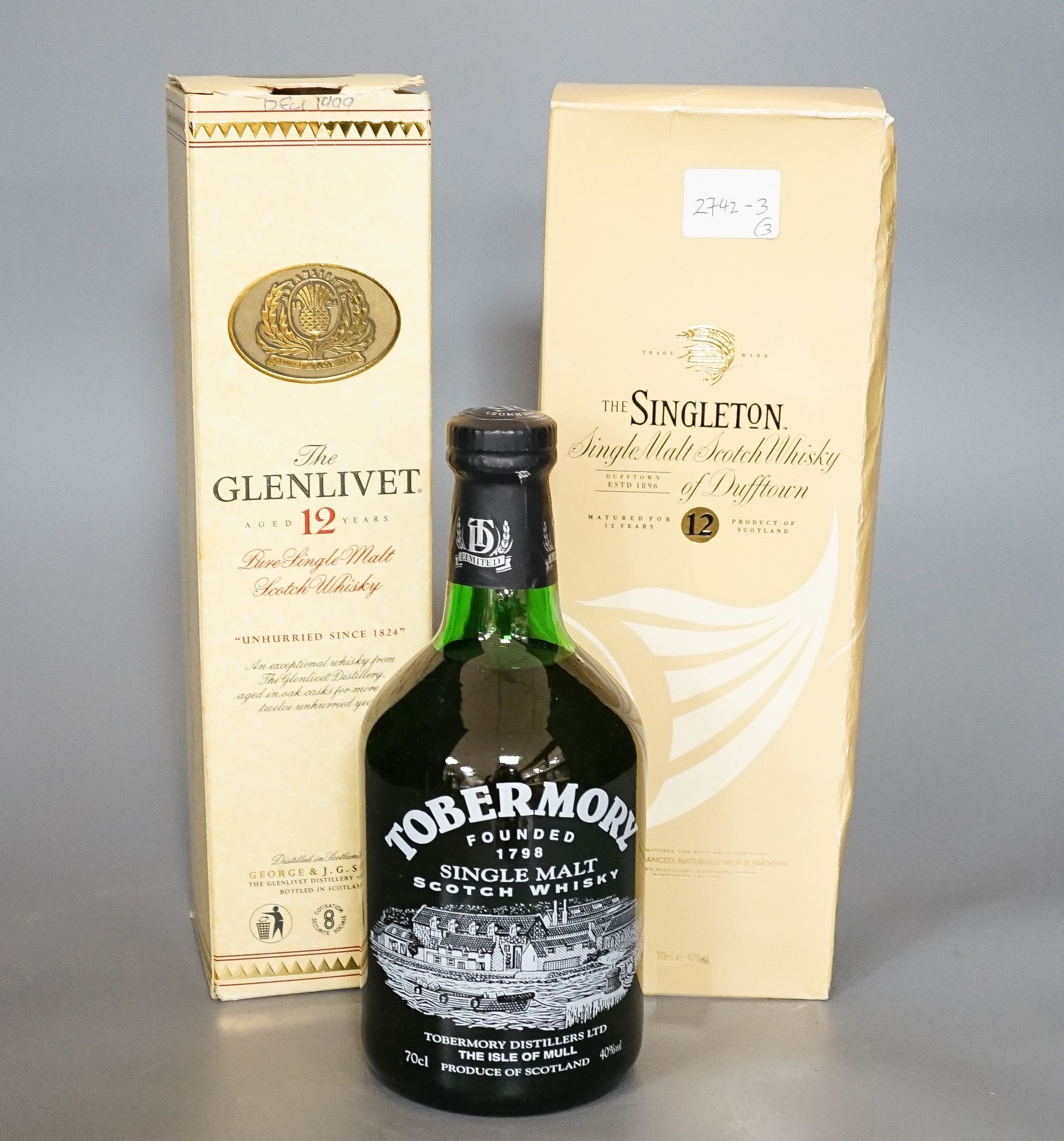 Three bottles of single malt whisky - The Singleton of Dufftown aged 12 years, Tobermory and The Glenlivet aged 12 years (3)